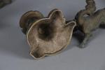 BOUGEOIRS (paire de petits) en bronze argenté à decor rocaille....