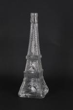 CARAFE en verre en forme de tour Eiffel. Signé SERRE....