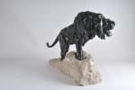 LECOURTIER, Prosper (1855-1924). Lion. Bronze à patine brune sur socle...