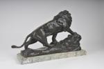 PELLIER, fin du 19ème siècle. Lion sur son rocher. Bronze...