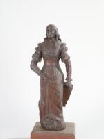* STATUETTE en chêne sculpté représentant une femme au parchemin,...