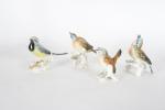 COLLECTION de onze oiseaux en porcelaine polychrome, moderne.