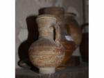 LOT de trois vases antiques en terre cuite. H. 19...