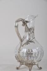 CARAFE en cristal taillé à monture d'argent. 19ème siècle. H....