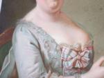 * ECOLE FRANCAISE du 19ème siècle. "Portrait de femme tenant...