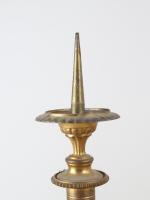 FLAMBEAUX (suite de quatre) pique-cierges en bronze ciselé et doré,...