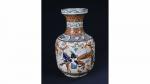 BIEN HOA. Vase en céramique émaillée à riche décor tournant...