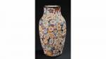 BIEN HOA. Vase en céramique émaillée à riche décor floral...