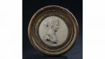 MEDAILLON circulaire en terre cuite sculpté en bas-relief du profil...