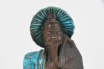 CHINE, 20e siècle, statuette d'un pêcheur en grès émaillé turquoise,...