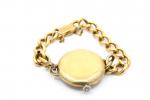 MONTRE bracelet de dame en or jaune 18k, cadran circulaire...