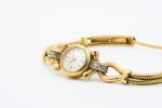 OMEGA - MONTRE bracelet de dame en or jaune 18k...