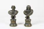 BUSTES (paire de petits) : "Voltaire" et "Rousseau". Bronzes patinés,...
