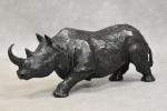 FAVRET (Christophe) "Le rhinocéros", bronze à patine brune et verte...