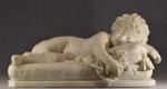 BRAGO (Enrico) "Enfant allongé assoupi" marbre,  l =63, p...