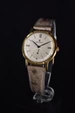 ROLEX Chronomètre : élégante montre plate Rolex chronomètre en or,...