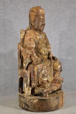 CHINE XVIIIe :  Sujet en bois sculpté anciennement laqué...