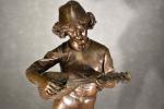 DUBOIS (P.) "Le joueur de mandoline", bronze à patine brune,...