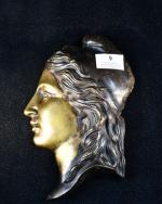 ANONYME "Marianne de profil" bronze à patine brune et or,...