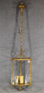 Suite de 3 lanternes-cages en bronze à décor de perles...