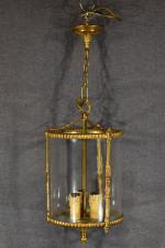Suite de 3 lanternes-cages en bronze à décor de perles...
