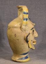 Vase à deux anses en céramique émaillée à décor de...