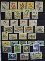 ASIE : un classeur de timbres oblitérés et quelques neufs