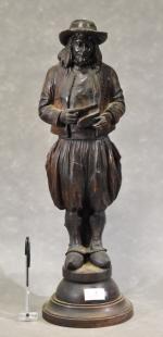ANONYME XIXe "Breton"en bois sculpté tenant sa pipe et sa...