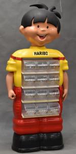 HARIBO : distributeur de bonbons à casiers réprésentant le personnage...