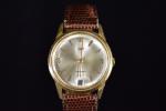 LIP : calendrier montre bracelet d'homme en or 18 k, mouvement...