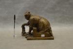BENOIT (D.) "La lavandière",  bronze à patine dorée, L...