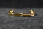 CHRISTIAN DIOR : Bracelet "Boucle de ceinture" en métal doré...