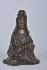 JAPON - XXe siècle
Statuette de Kannon assise les mains jointes...