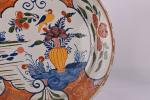 Delft XVIIIe
Grand plat circulaire en faïence émaillée polychrome d'un décor...