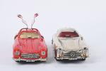Märklin contemporain, deux Mercedes de course
mécaniques, une rouge, une chromée,...