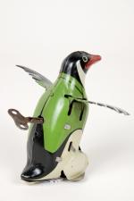 Joustra, France, Gigi le pingouin,
jouet mécanique en tôle lithographiée, bel...
