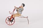 Cycliste sur monocycle,
jouet à pousser attribué à Vichy. Tête en...