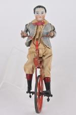 Cycliste sur monocycle,
jouet à pousser attribué à Vichy. Tête en...