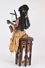 Gustave Vichy, harpiste mauresque 
assise sur un tabouret en bois...