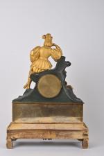 Pendule en bronze doré à décor de troubadour, cadran en...
