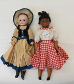 Deux poupées tête porcelaine unis France,
traits peints, corps semi-articulé, dont...