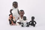 Quatre bébés noirs en celluloïd ou composition 
dont un Petitcollin...