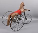 Petit cheval tricycle fin XIXème
repeint marron, trois roues en fer,...