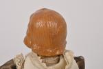 Fillette, tête et membres en céramique 
modelée peintes, chevelure rousse,...