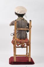 Gustave Vichy
Noir buveur
Il est assis sur une chaise en bambou,...