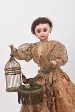 Jeune femme dressant un oiseau
Charmant automate vers 1900. Cette jeune...