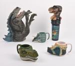 Jurassic Park, produits dérivés : 
trois tasses et cup TM...