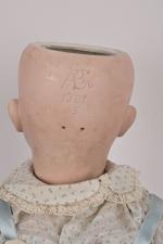 Bébé allemand tête porcelaine marquée en creux
"ABG 1361.55" bouche ouverte...