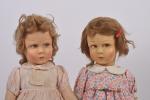 Deux poupées françaises en feutre pressé
traits peints, yeux marron regardant...