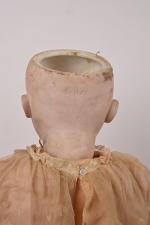 Poupée tête porcelaine marquée en creux 
"1904 Edouardo Juan made...